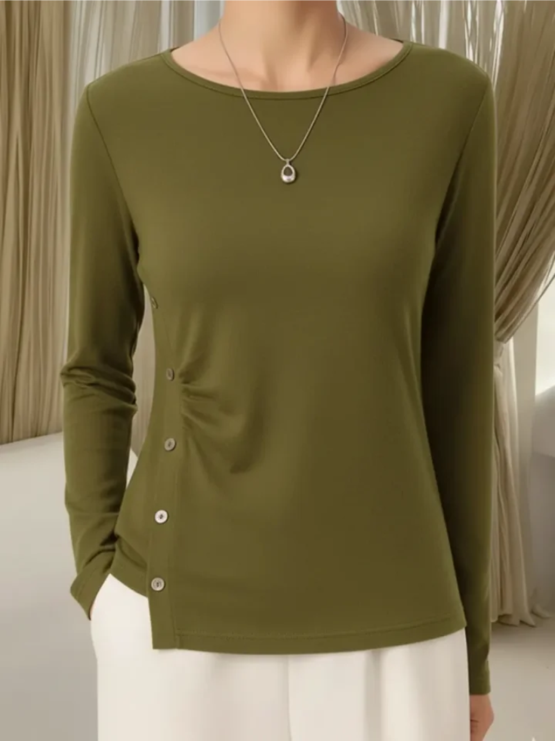 Mila – Gebreide top met subtiele knoopdetails